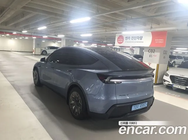 Tesla Model Y — Фото автомобиля 5