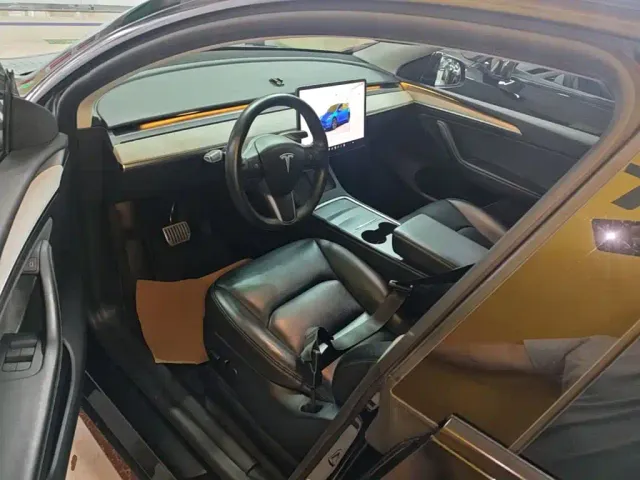Tesla Model Y — Фото автомобиля 15
