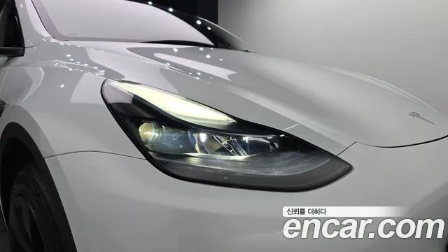 Tesla Model Y — Фото автомобиля 7