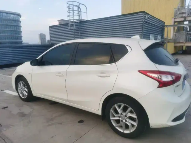 Nissan Tiida — Фото автомобиля 11