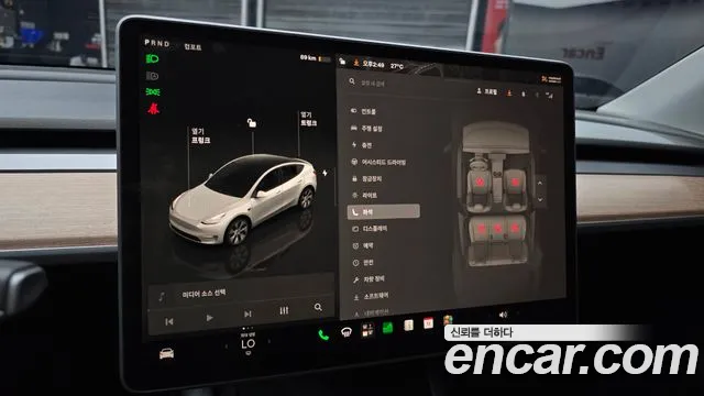 Tesla Model Y — Фото автомобиля 16