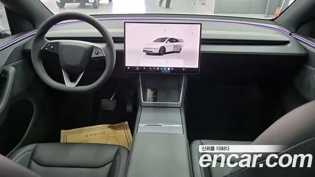 Tesla Model Y — Фото автомобиля 5