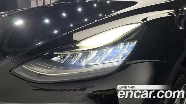 Tesla Model Y — Фото автомобиля 7