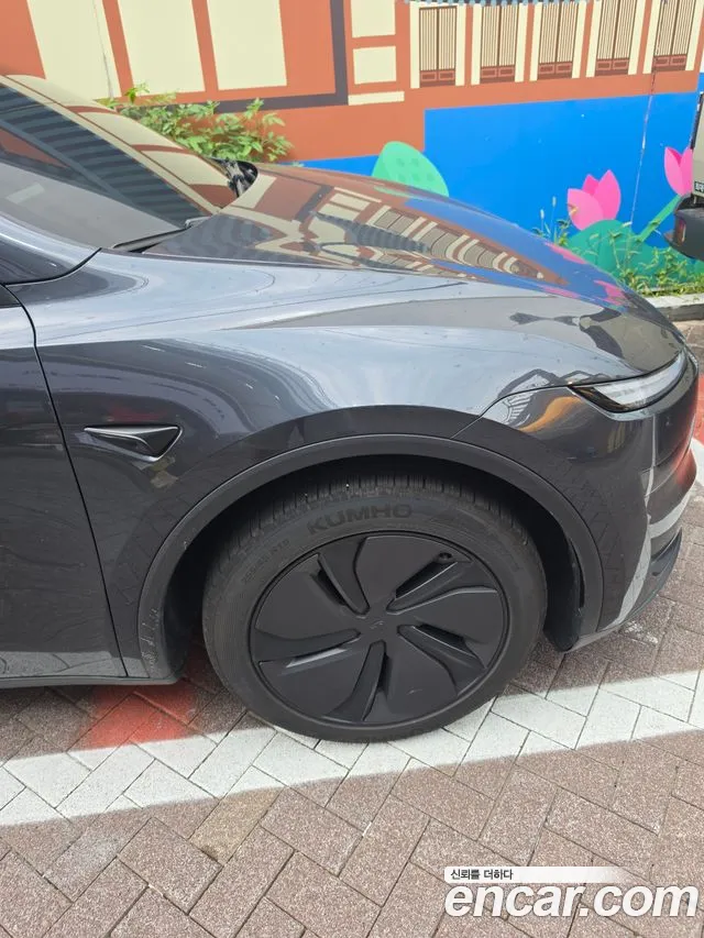 Tesla Model Y — Фото автомобиля 5