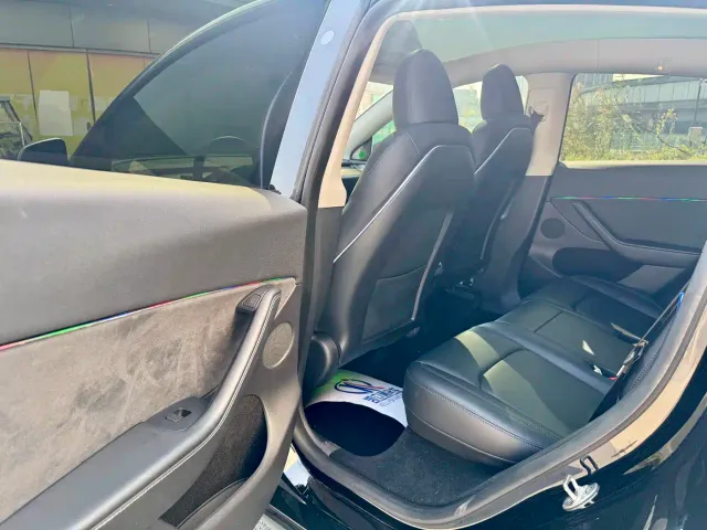 Tesla Model Y — Фото автомобиля 7