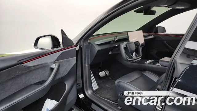 Tesla Model Y — Фото автомобиля 10