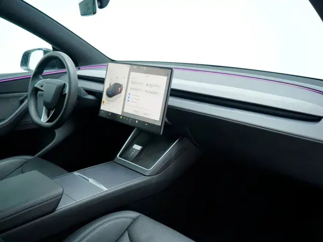 Tesla Model Y — Фото автомобиля 15