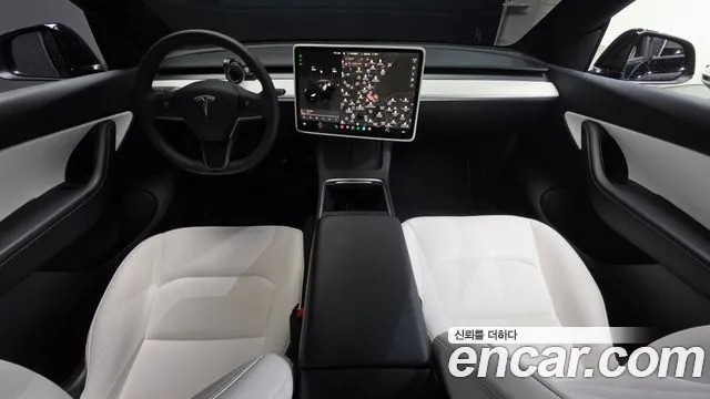 Tesla Model Y — Фото автомобиля 7