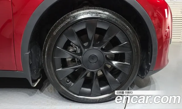 Tesla Model Y — Фото автомобиля 6