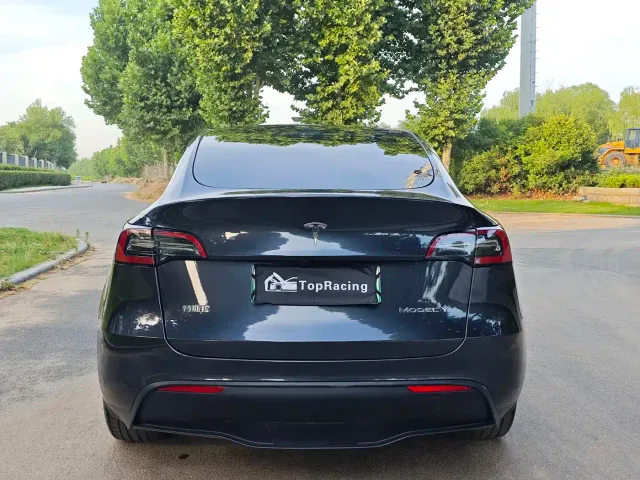 Tesla Model Y — Фото автомобиля 8