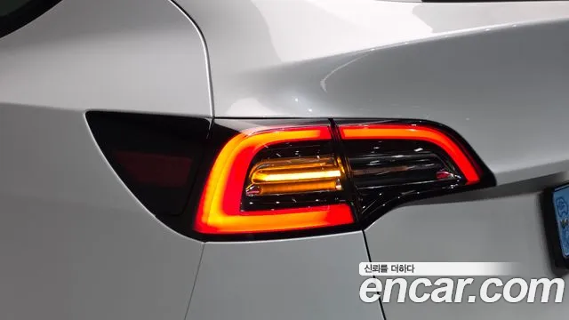 Tesla Model Y — Фото автомобиля 8