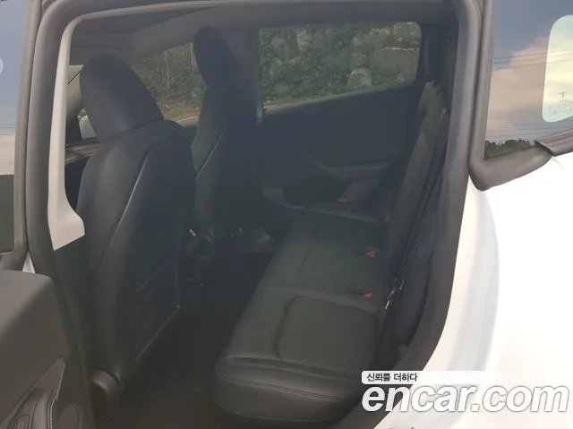 Tesla Model Y — Фото автомобиля 7