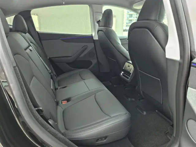 Tesla Model Y — Фото автомобиля 11