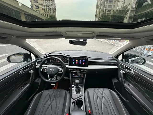 Volkswagen Tiguan L — Фото автомобиля 5