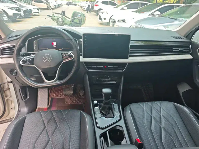 Volkswagen Tiguan L — Фото автомобиля 9