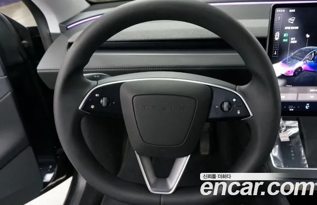 Tesla Model Y — Фото автомобиля 14