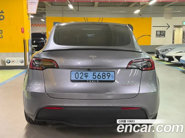 Tesla Model Y — Фото автомобиля 4