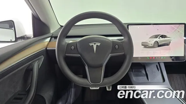 Tesla Model Y — Фото автомобиля 19