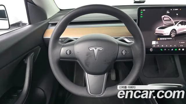 Tesla Model Y — Фото автомобиля 12