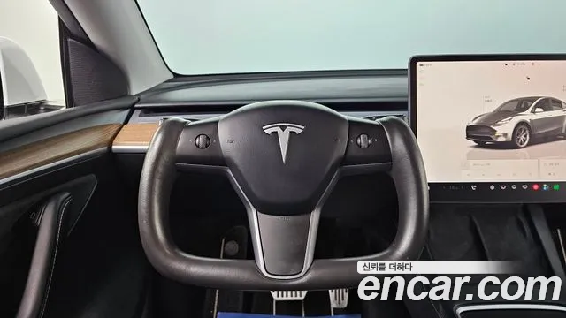 Tesla Model Y — Фото автомобиля 13