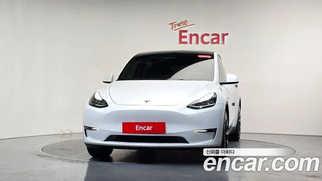 Tesla Model Y — Фото автомобиля 3
