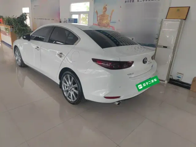 Mazda Axela — Фото автомобиля 22