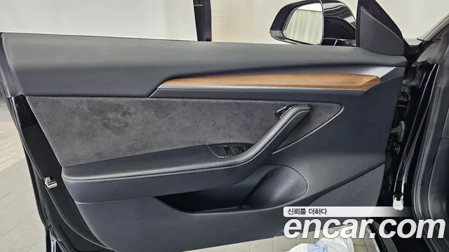 Tesla Model 3 — Фото автомобиля 13