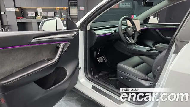 Tesla Model Y — Фото автомобиля 15