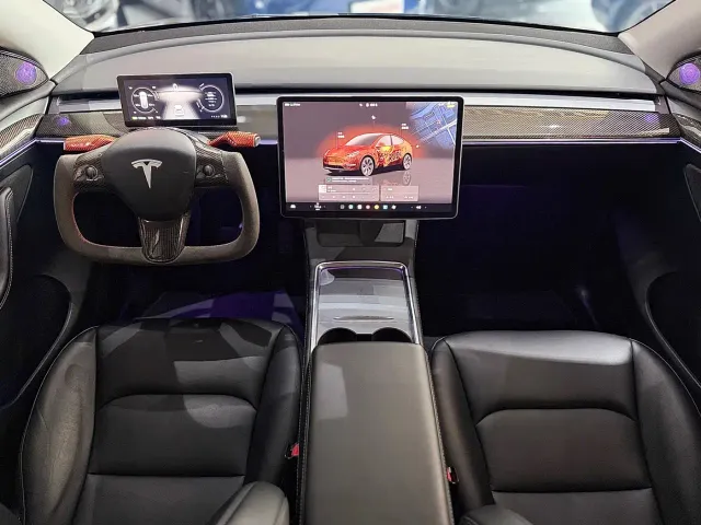 Tesla Model Y — Фото автомобиля 9