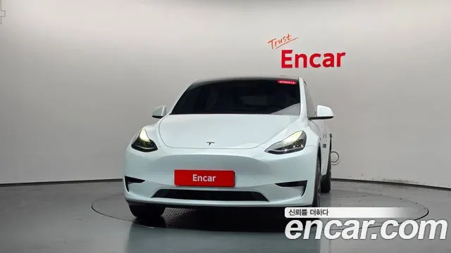 Tesla Model Y — Фото автомобиля 3