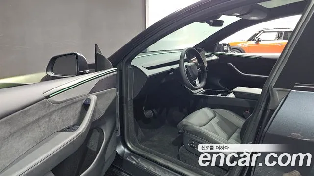Tesla Model Y — Фото автомобиля 10