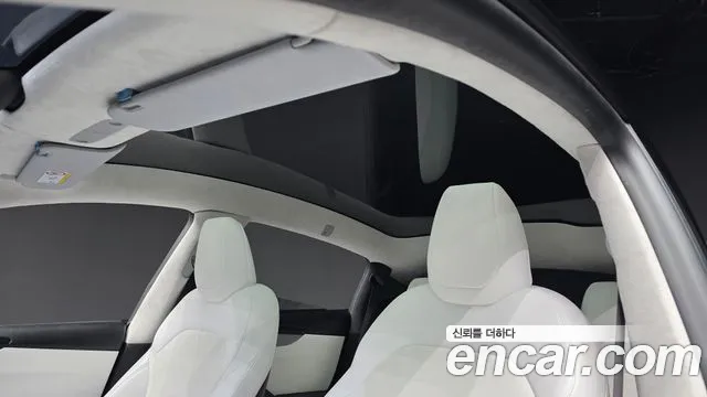 Tesla Model Y — Фото автомобиля 19