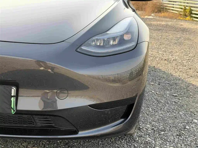 Tesla Model Y — Фото автомобиля 13