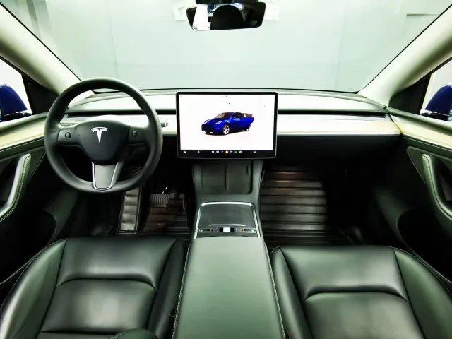 Tesla Model Y — Фото автомобиля 11