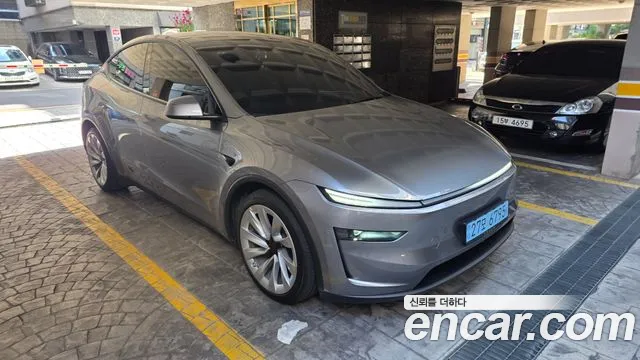 Tesla Model Y — Фото автомобиля 3