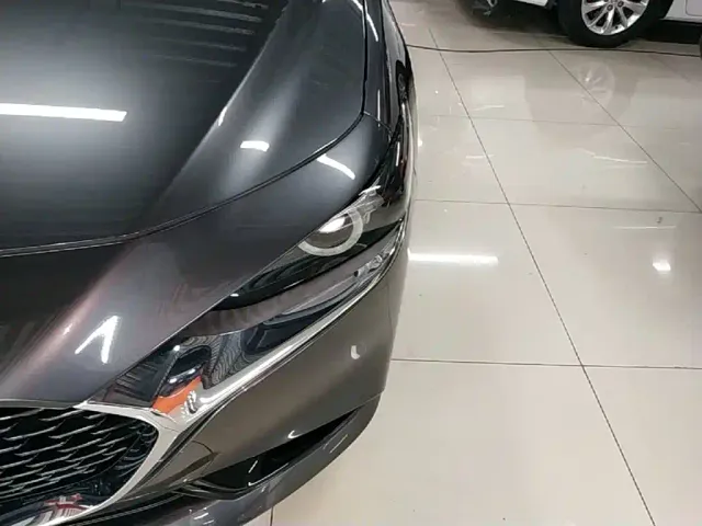 Mazda Axela — Фото автомобиля 23