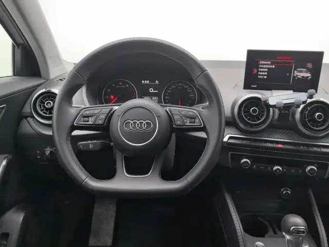 Audi Q2L — Фото автомобиля 11