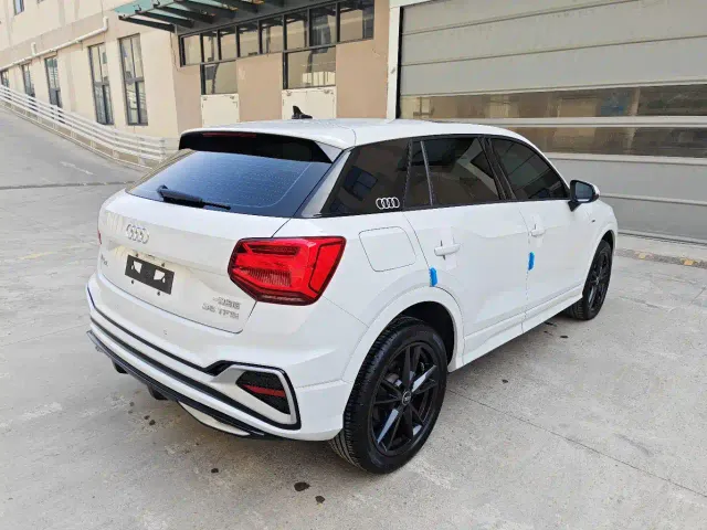 Audi Q2L — Фото автомобиля 9
