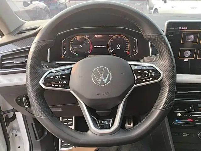 Volkswagen Tiguan L — Фото автомобиля 10