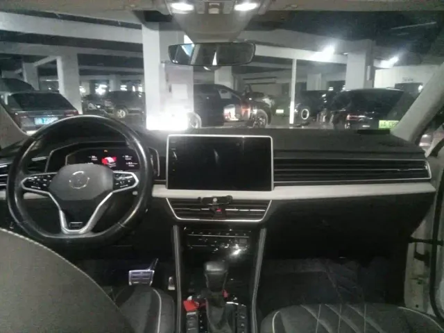 Volkswagen Tiguan L — Фото автомобиля 12