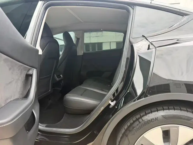 Tesla Model Y — Фото автомобиля 6
