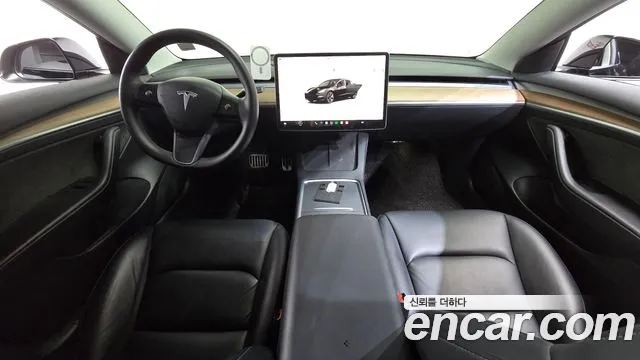 Tesla Model 3 — Фото автомобиля 10