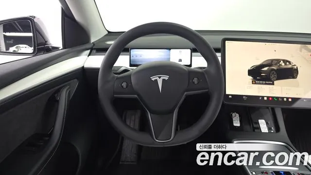 Tesla Model Y — Фото автомобиля 17