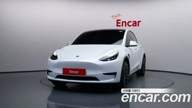 Tesla Model Y — Фото автомобиля 3