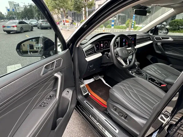 Volkswagen Tiguan L — Фото автомобиля 16
