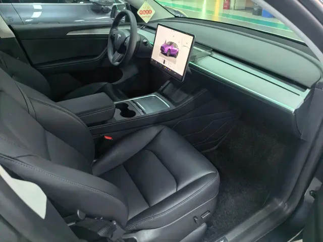 Tesla Model Y — Фото автомобиля 7