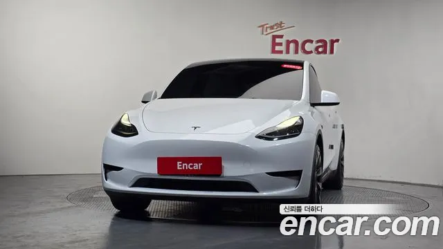 Tesla Model Y — Фото автомобиля 2
