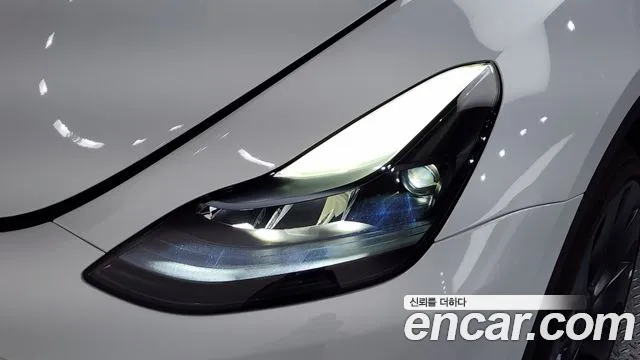 Tesla Model Y — Фото автомобиля 18