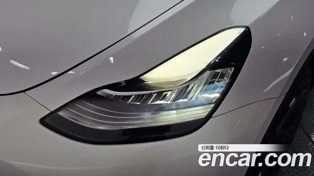 Tesla Model Y — Фото автомобиля 22