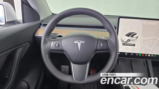 Tesla Model Y — Фото автомобиля 12